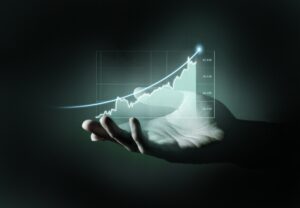 Investimentos e suas vantagens.
Imagem ilustrativa de um gráfico de crescimento financeiro, com uma seta ascendente representando o aumento do patrimônio ao longo do tempo, cercada por ícones de diferentes tipos de investimentos, como ações, fundos imobiliários, criptomoedas e títulos de renda fixa.