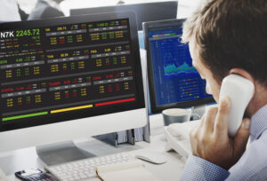 Gráfico que representa o funcionamento da Bolsa de Valores, com variações de preços e movimentação do mercado financeiro.